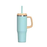 Oversized travel tumbler with grip handle and straw